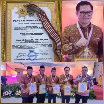 Bupati Joune Ganda Terima Penghargaan Wredatama Nugraha Utama dari PWRI